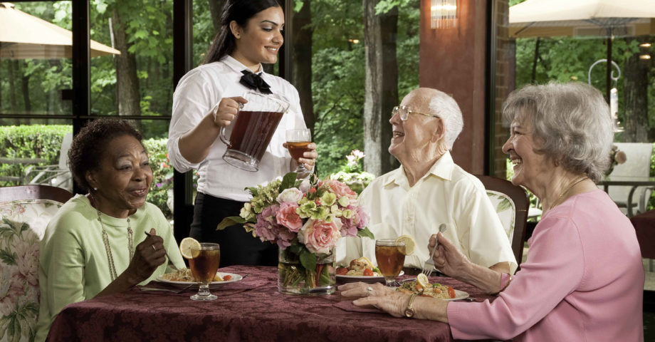 Senior residents enjoying a meal in the Potomac Place dining room.