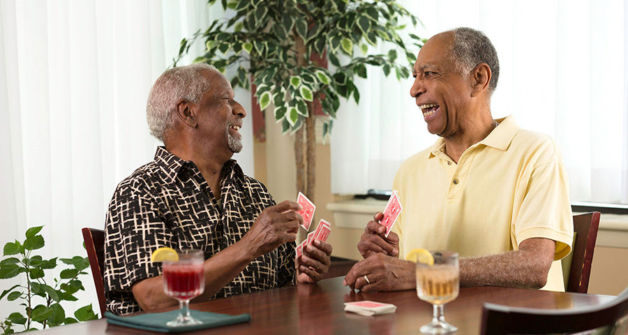 friends playing cards at Potomac Place