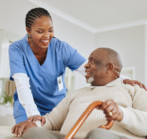 Shot of a nurse speaking to her male patient